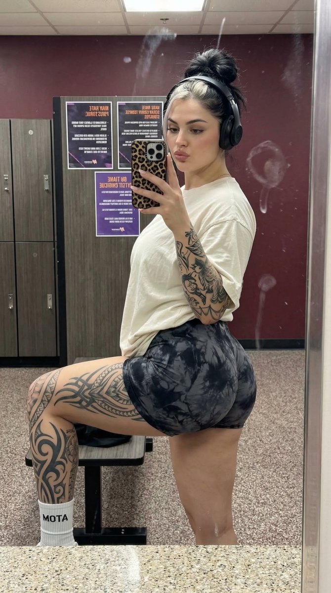 Athletic Woman Post-Workout Mirror Selfie with Tattoos — Nano Banana Pro AI Generated Image