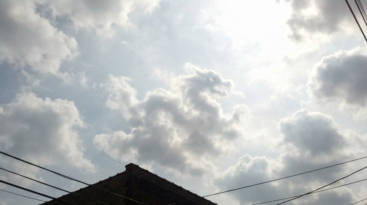 Cloud Pareidolia Smartphone Snapshot — Nano Banana Pro AI Generated Image