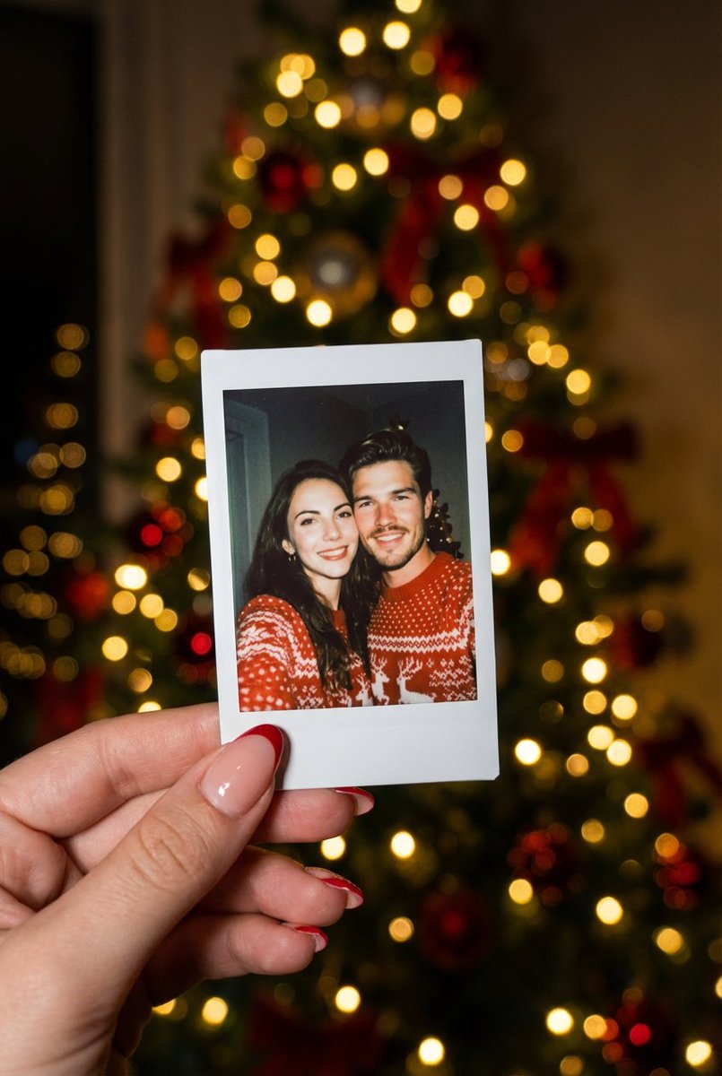 Photorealistic Polaroid Couple Selfie with Christmas Bokeh — Nano Banana Pro AI Generated Image