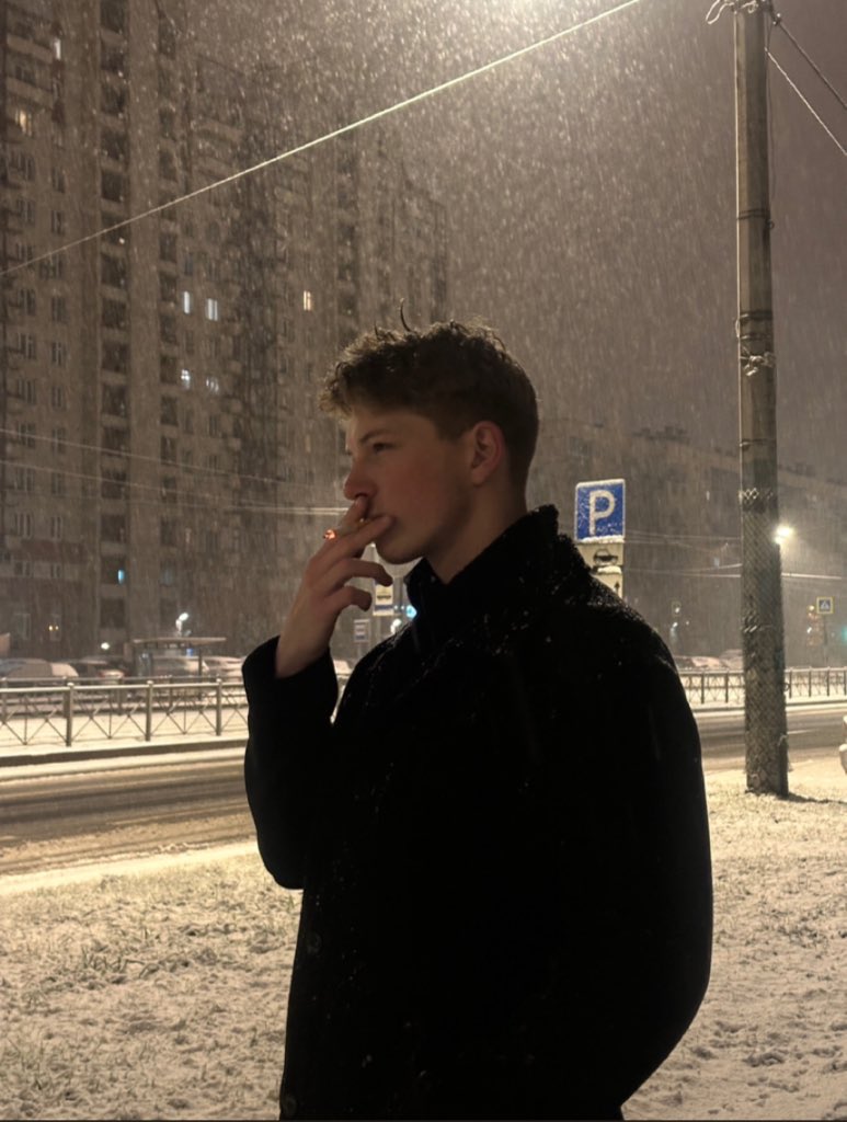 Photorealistic Night Portrait of Man Smoking in Snow — Nano Banana Pro AI Generated Image