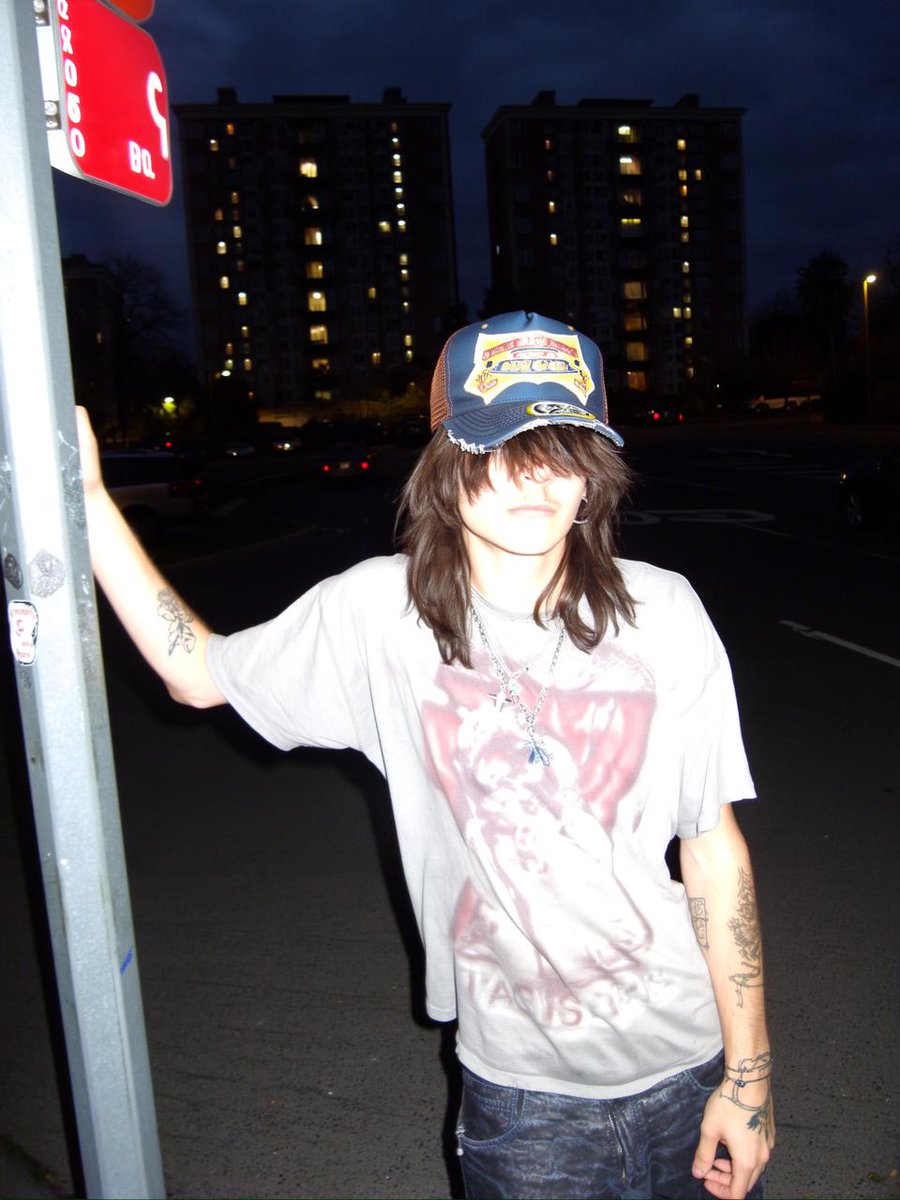 Clothing items laid out on asphalt — Nano Banana Pro AI Generated Image