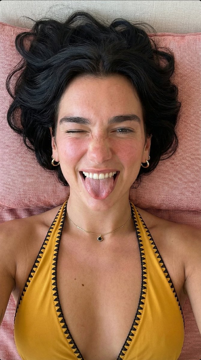 Playful Overhead Portrait with Winking Expression Prompt (Black Hair) — Nano Banana Pro AI Generated Image